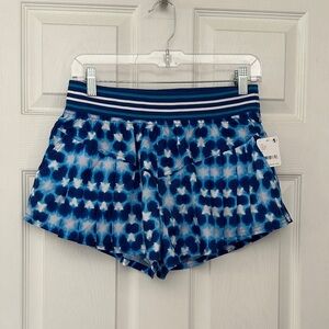 FP Movement Blue Patterned Athletic Shorts with pockets and panty.